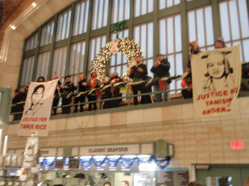 Justice for Tamir and Tanisha Banner Drops and Singing at West Side Market